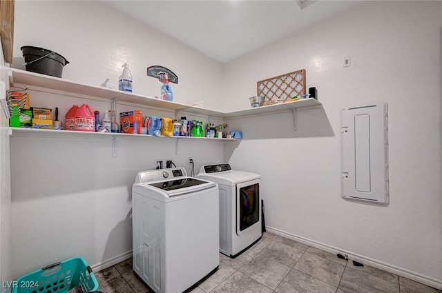 laundry area featuring washing machine and clothes dryer