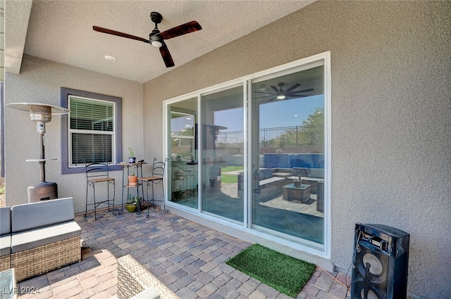 view of patio with ceiling fan