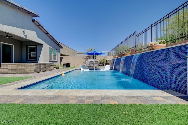 view of pool featuring a patio area and pool water feature