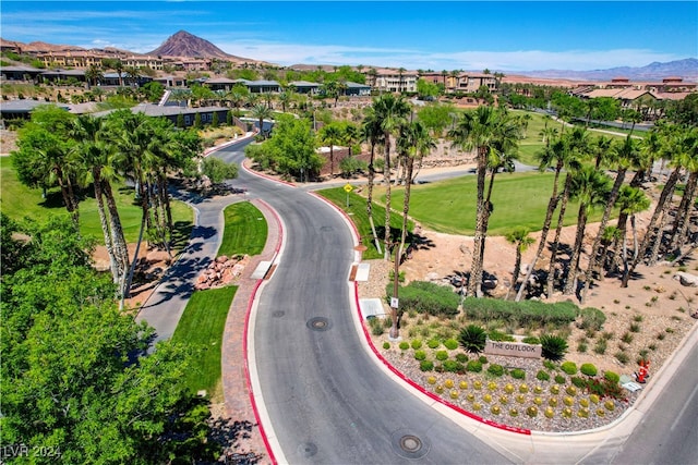 birds eye view of property featuring a mountain view