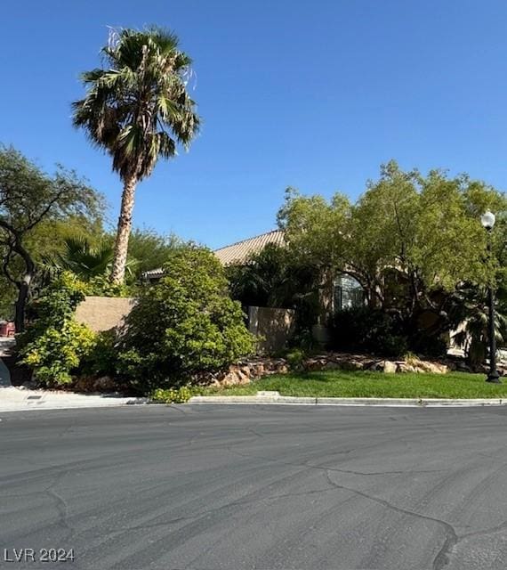 1024 Eaglewood Dr, Las Vegas, NV 89144 - view of asphalt street featuring curbs