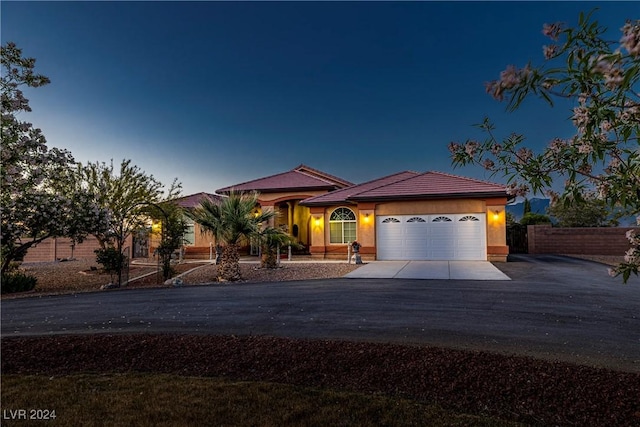 view of front of property featuring a garage