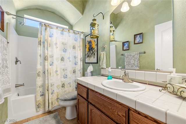 full bathroom featuring vanity, toilet, and shower / bath combo with shower curtain