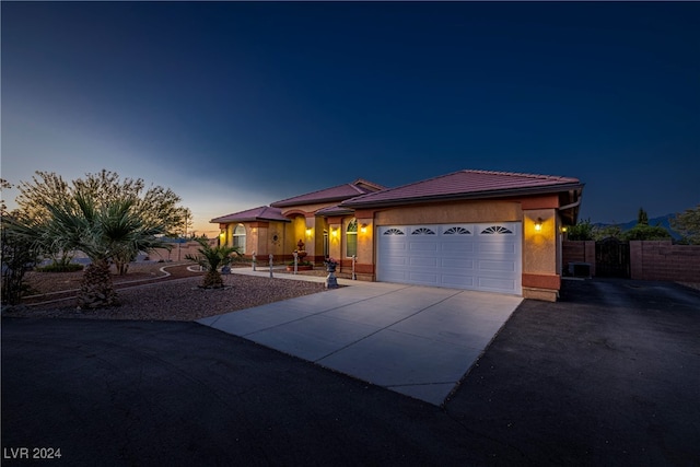 view of front of property with a garage