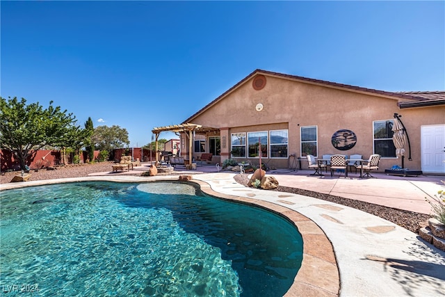 view of pool featuring a pergola and a patio area