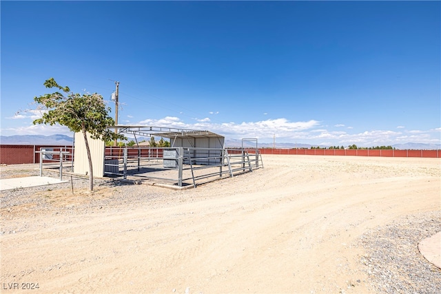 view of outbuilding featuring a rural view