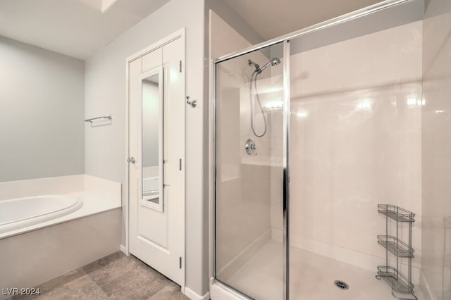 bathroom with independent shower and bath