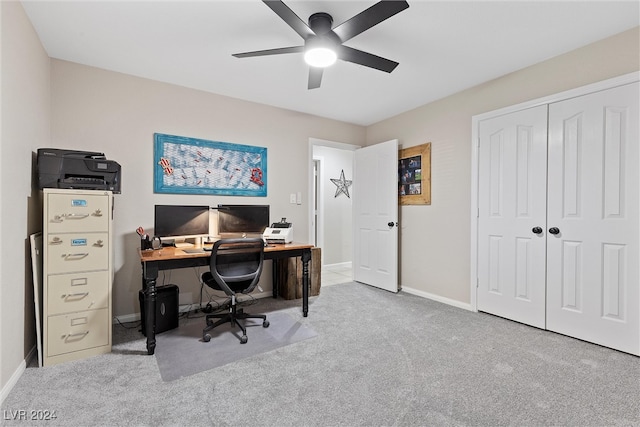 carpeted office with ceiling fan