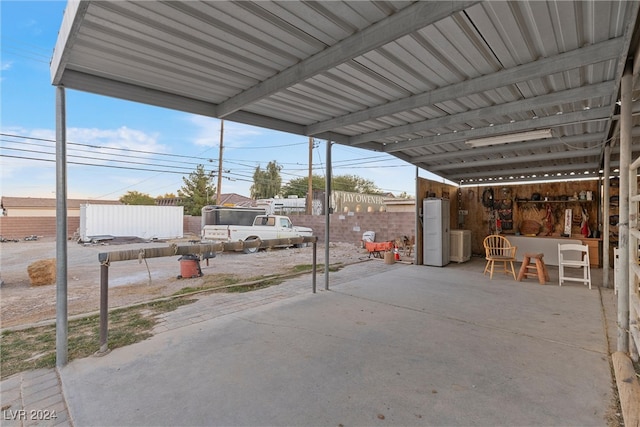 view of patio featuring water heater