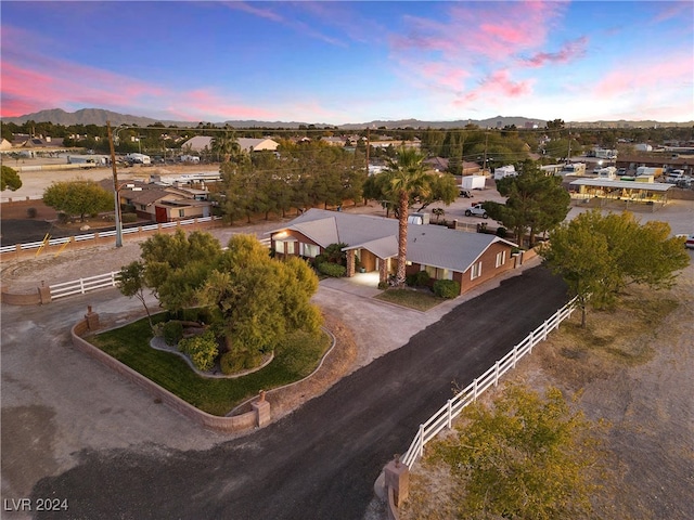 aerial view at dusk with a mountain view