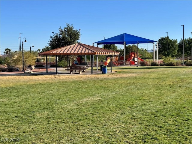 view of home's community with a gazebo, a playground, and a yard