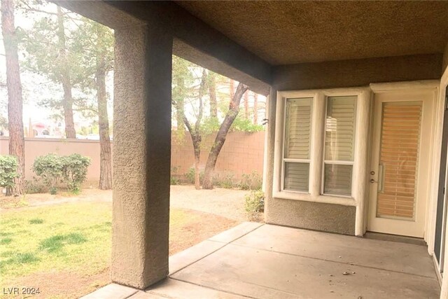 view of patio / terrace with fence