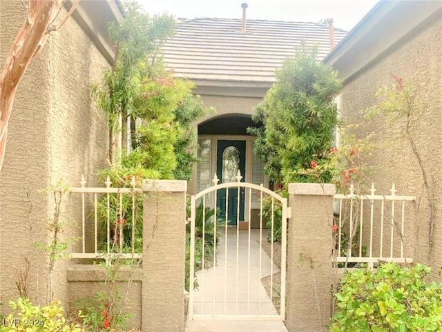 view of gate featuring fence