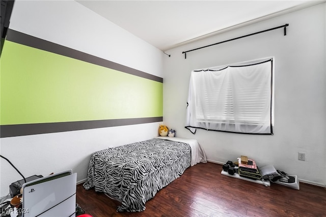 bedroom featuring dark hardwood / wood-style floors