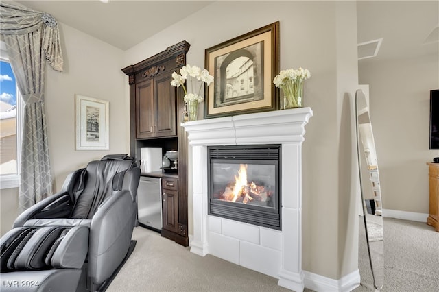 living room with light colored carpet