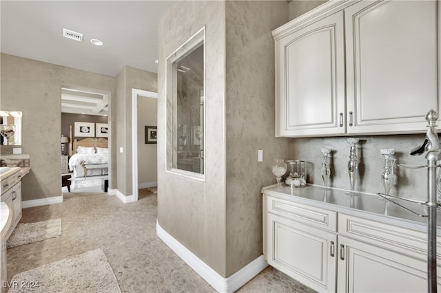 kitchen with white cabinets