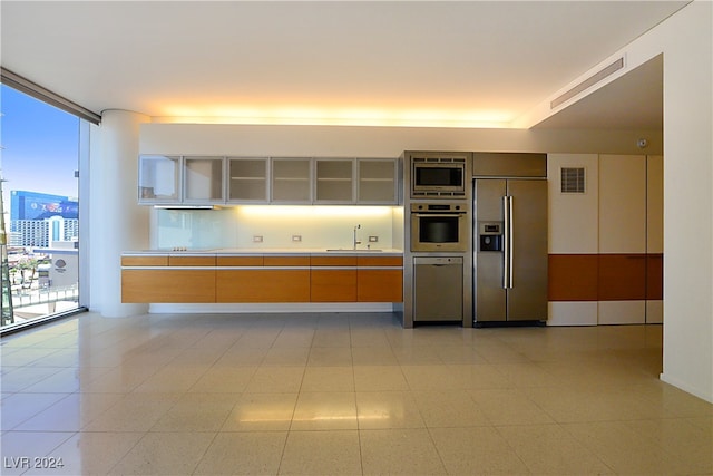 kitchen featuring built in appliances