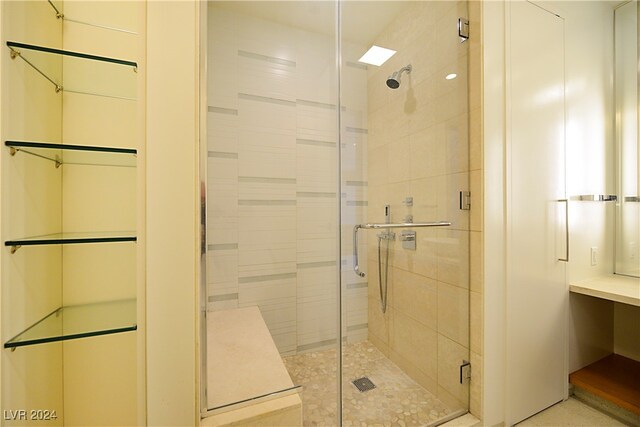 bathroom featuring an enclosed shower