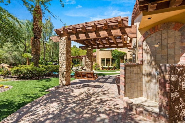 view of patio featuring a pergola