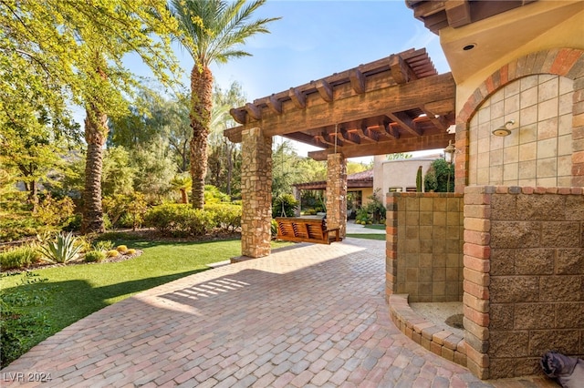 view of patio featuring a pergola