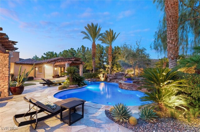 view of pool featuring a patio area