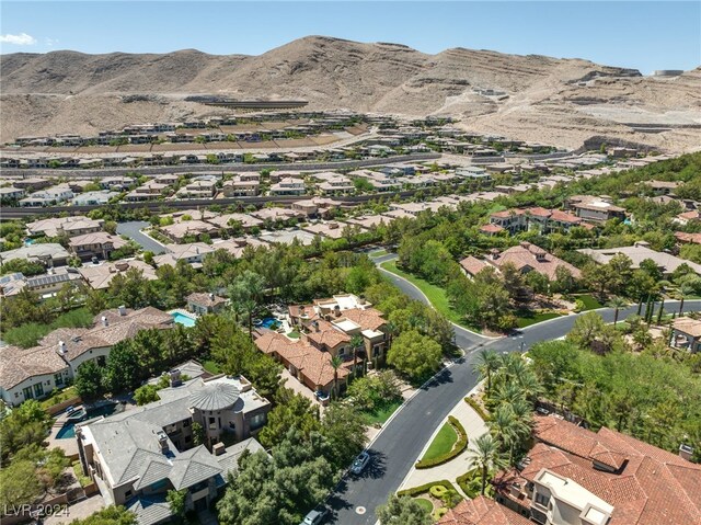 bird's eye view with a mountain view