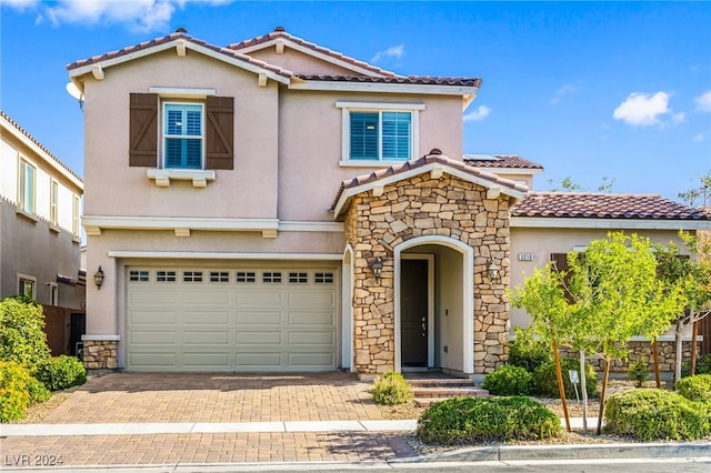 view of front of home with a garage