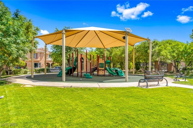 view of playground featuring a lawn