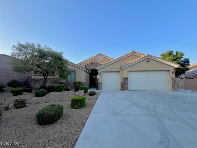 single story home with a garage