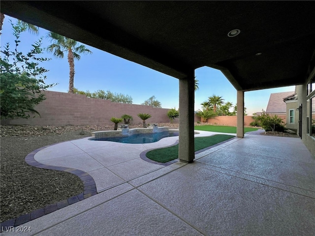 view of patio / terrace featuring a fenced in pool