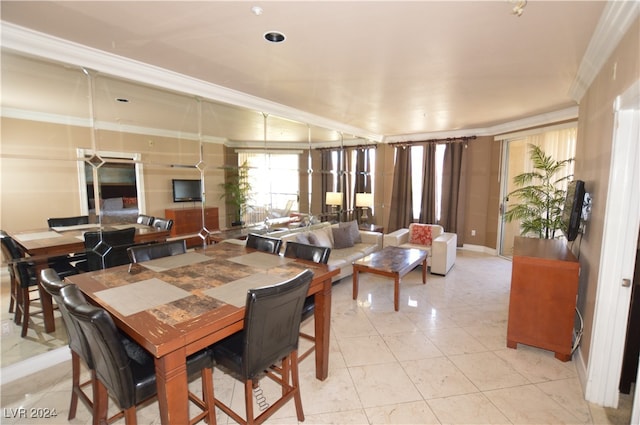 dining room with crown molding