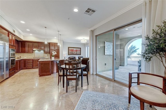 dining room with recessed lighting, visible vents, and crown molding