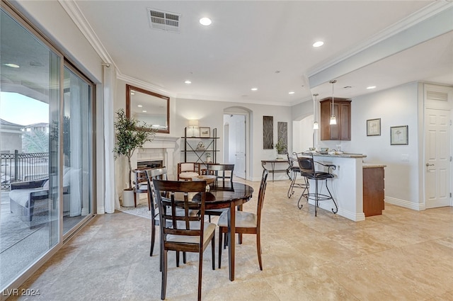 dining area featuring ornamental molding