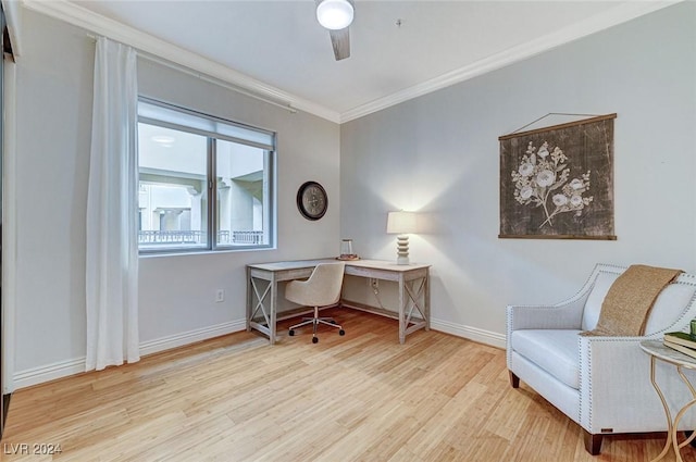 home office with wood finished floors, crown molding, baseboards, and ceiling fan