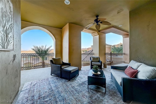 view of patio with ceiling fan and an outdoor hangout area