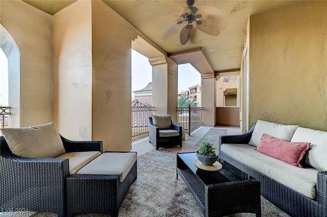 view of patio / terrace with a ceiling fan, a balcony, and an outdoor hangout area