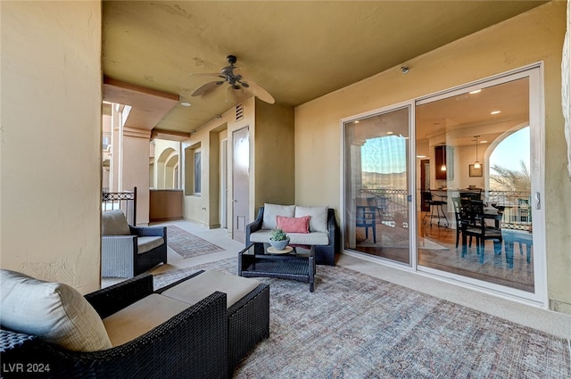 view of patio / terrace featuring an outdoor living space and ceiling fan