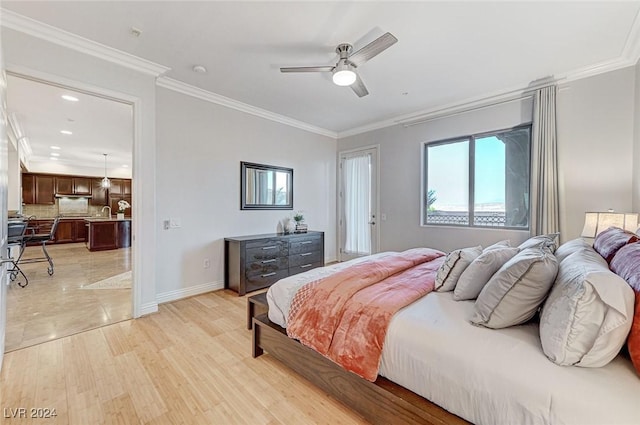 bedroom with a ceiling fan, baseboards, crown molding, and light wood-style floors