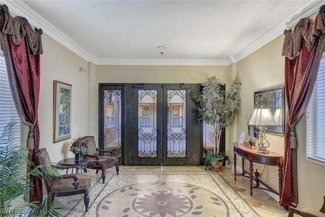 entrance foyer featuring french doors, baseboards, and ornamental molding