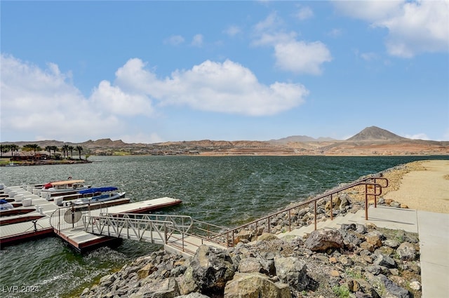 dock area featuring a water and mountain view