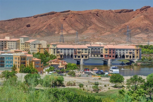 view of mountain feature with a water view