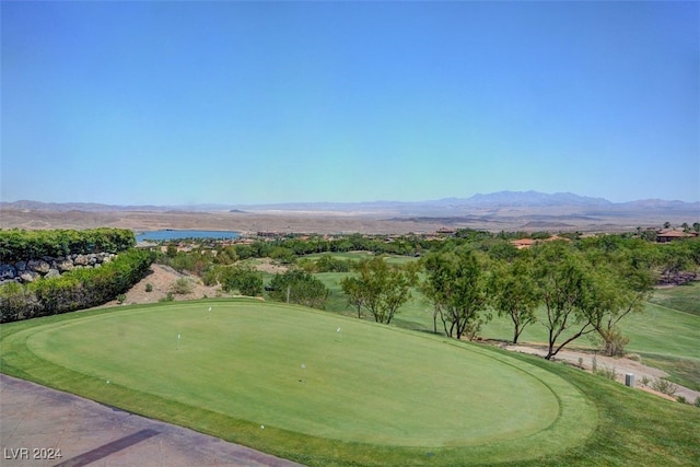 view of property's community featuring a water and mountain view