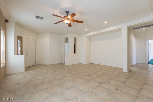 spare room featuring ornamental molding, recessed lighting, visible vents, and ceiling fan
