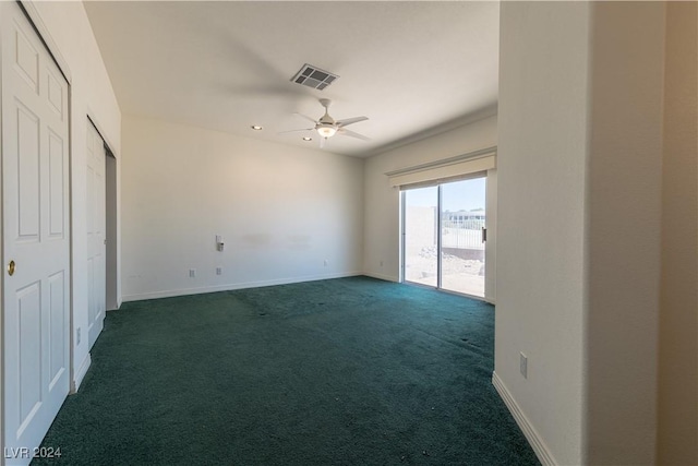 unfurnished bedroom with visible vents, baseboards, dark colored carpet, a ceiling fan, and access to outside