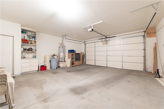 garage with a garage door opener and water heater