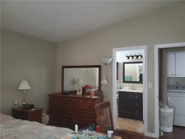 bedroom with washer / dryer and ensuite bath