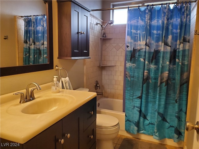 full bathroom featuring vanity, shower / tub combo with curtain, toilet, and tile patterned floors