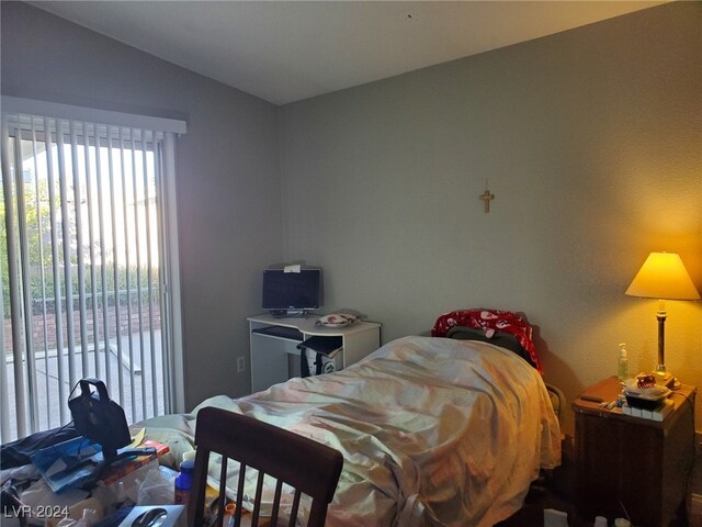 bedroom featuring vaulted ceiling