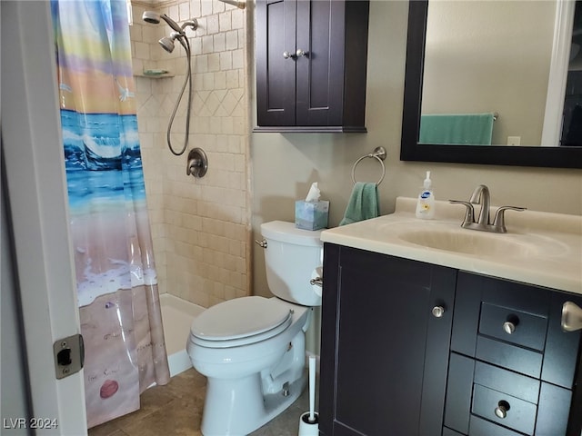 bathroom featuring toilet, walk in shower, vanity, and tile patterned floors