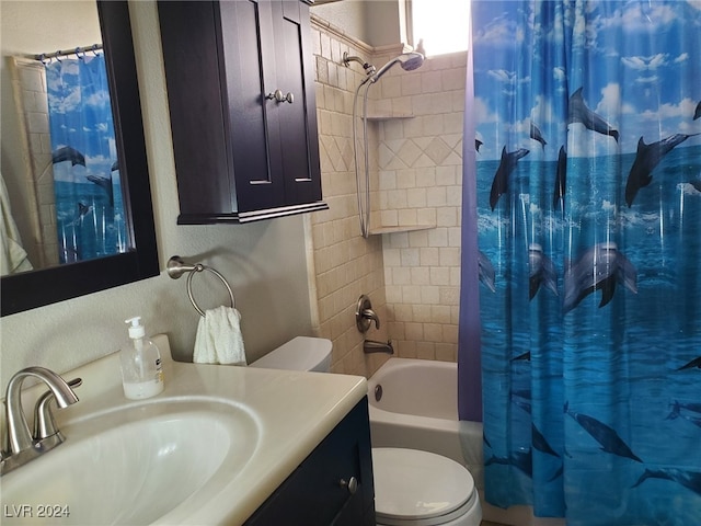 full bathroom with vanity, toilet, and shower / tub combo with curtain